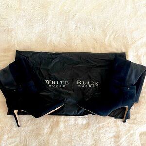 White House Black Market black suede boot.
